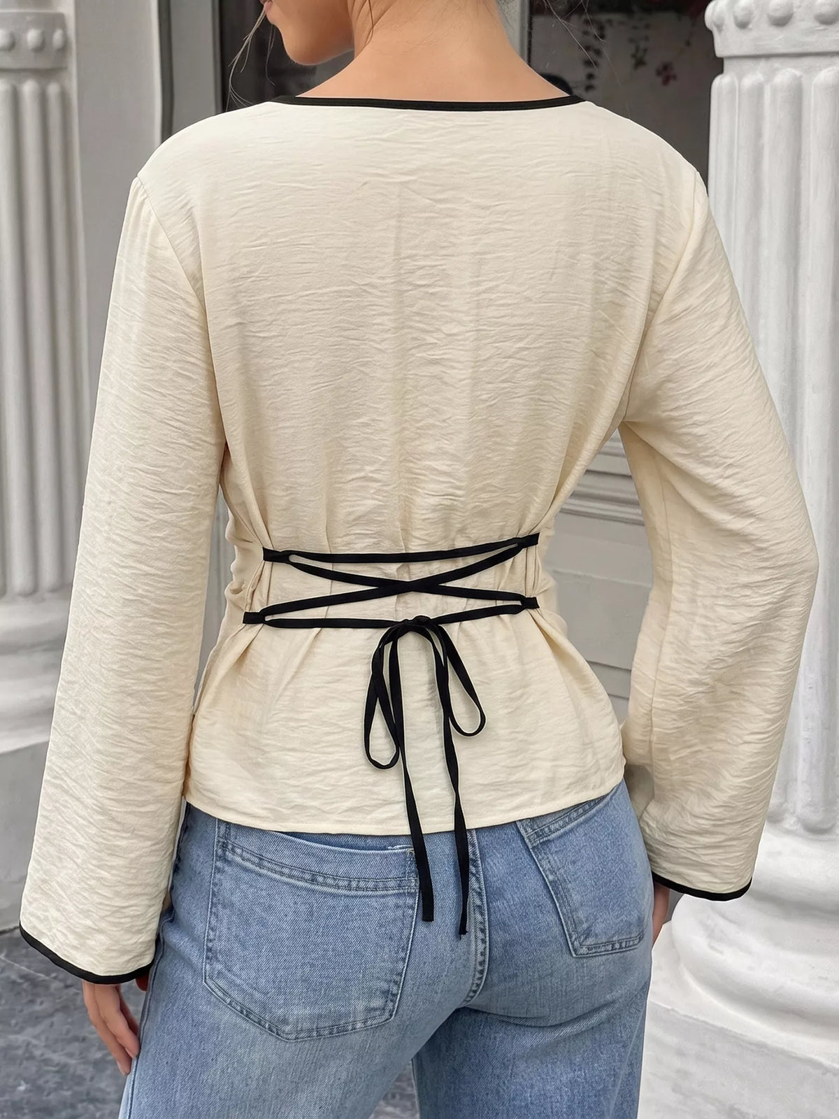 Plush Fashion Hub contrast trim flare sleeve blouse with stylish design and lightweight fabric, perfect for casual or office wear.