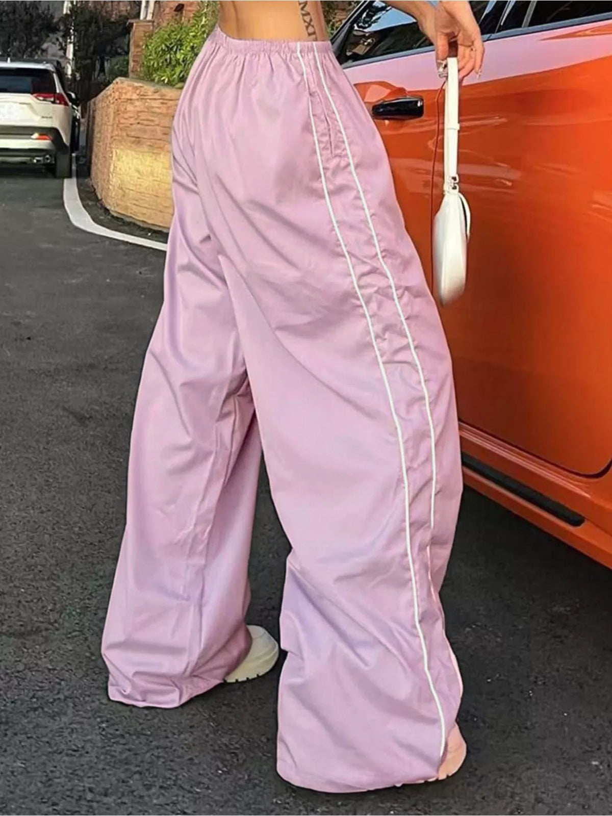 Women's lightweight high-rise wide-leg pants with elastic waist, shown as a stylish dress in soft fabric from Plush Fashion Hub.
