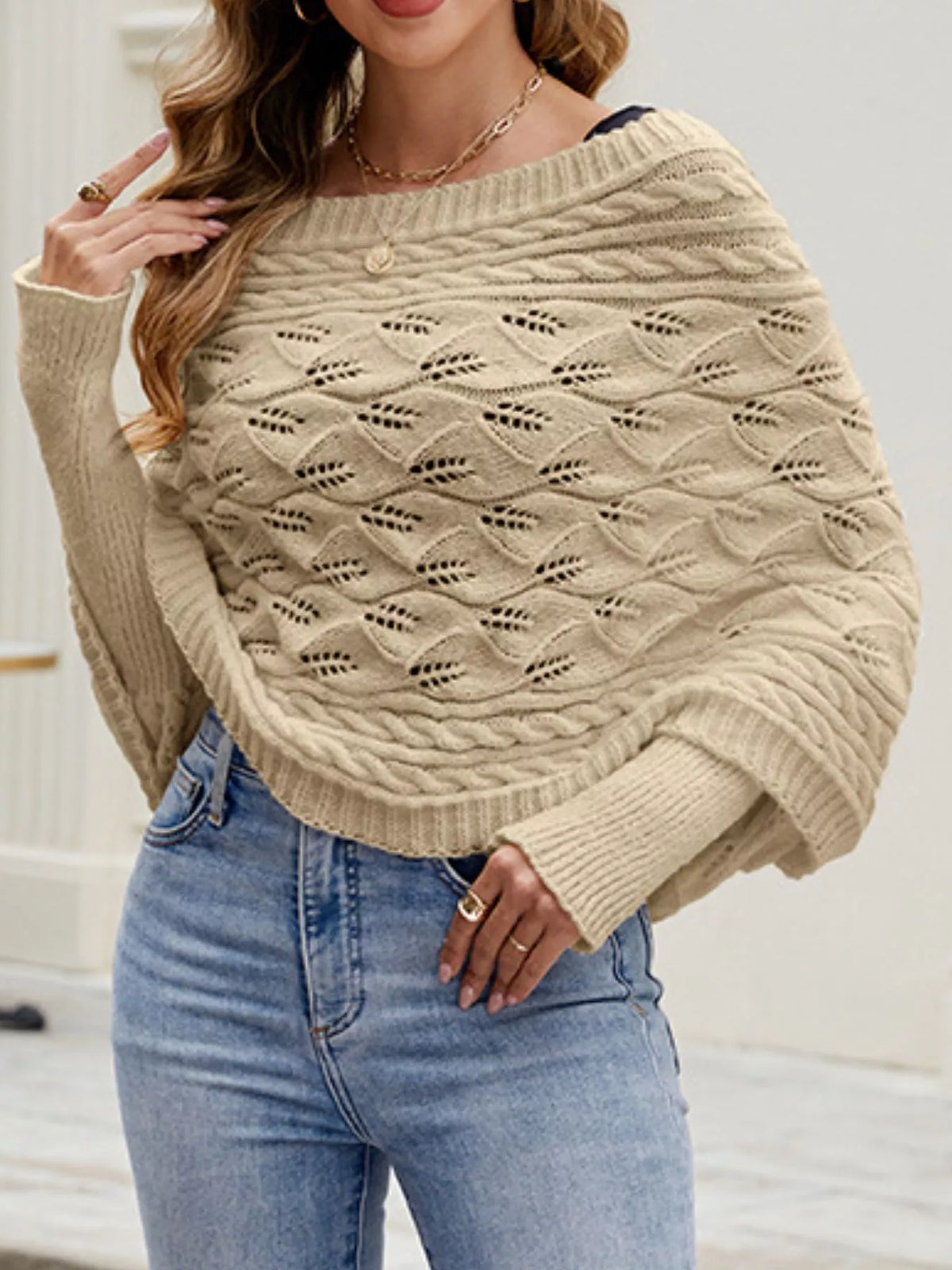 Cable knit batwing sleeve sweater from Plush Fashion Hub, shown in a cozy, stylish shirt design with textured knit fabric.