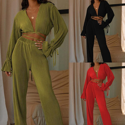 Women's Clothing Solid Color And V-neck Fashion SuitElevate your style game with our Women's Clothing Solid Color And V-neck Fashion Suit! Featuring a sleek solid color design and a flattering V-neck cut, this suit is2 piece Pants setPlush Fashions ShopPlush Fashion Shop