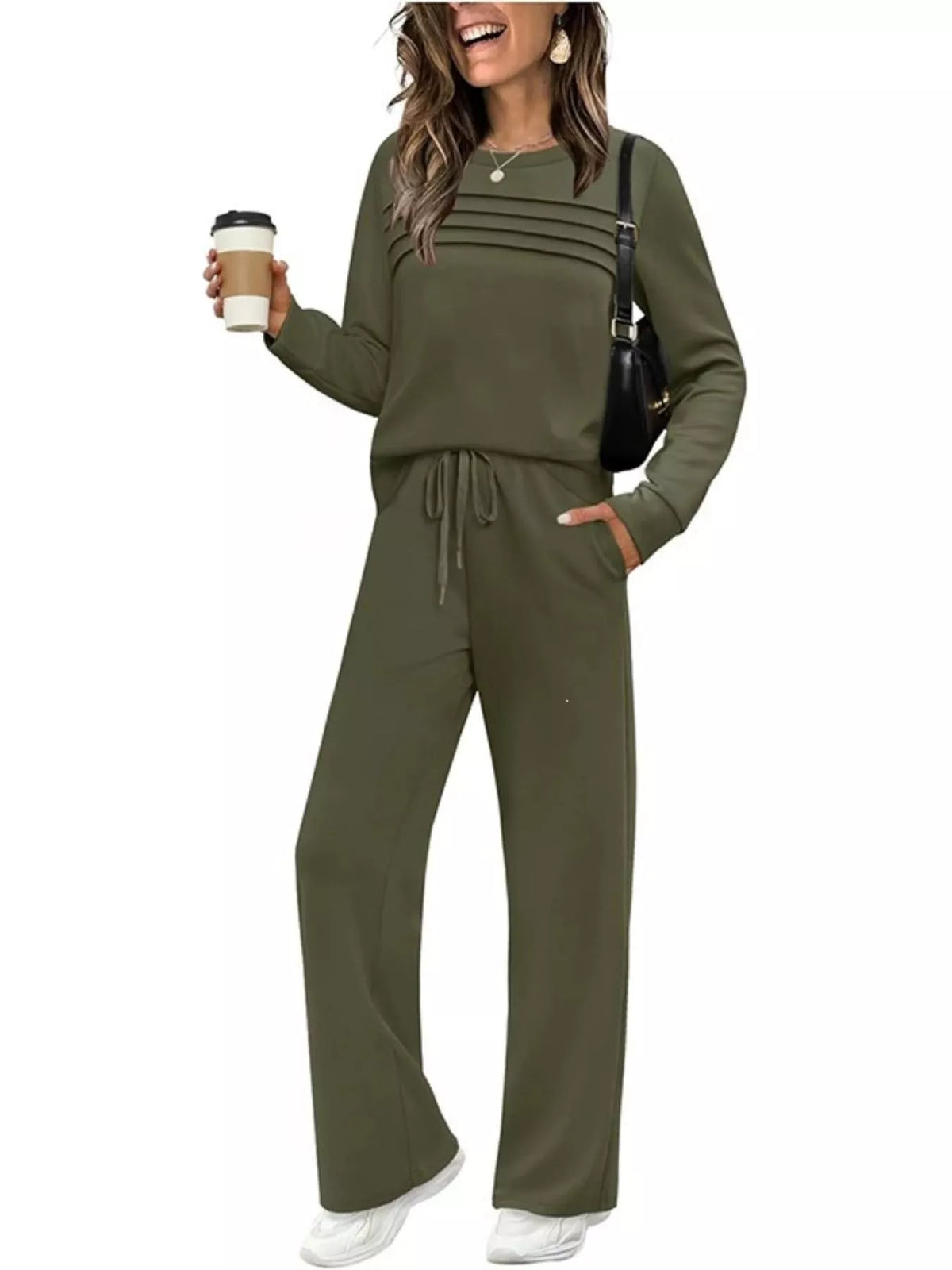 Plus size casual long sleeve crewneck top with drawstring pants set by Trendsi, featuring comfortable, relaxed fit in soft fabric.