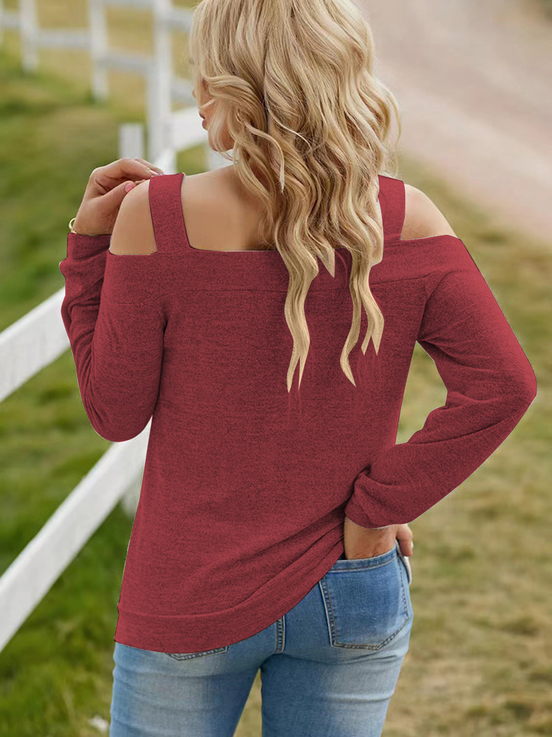 Women's elegant cold shoulder polyester blouse from Plush Fashion Hub, featuring cutout design and stylish long sleeves.