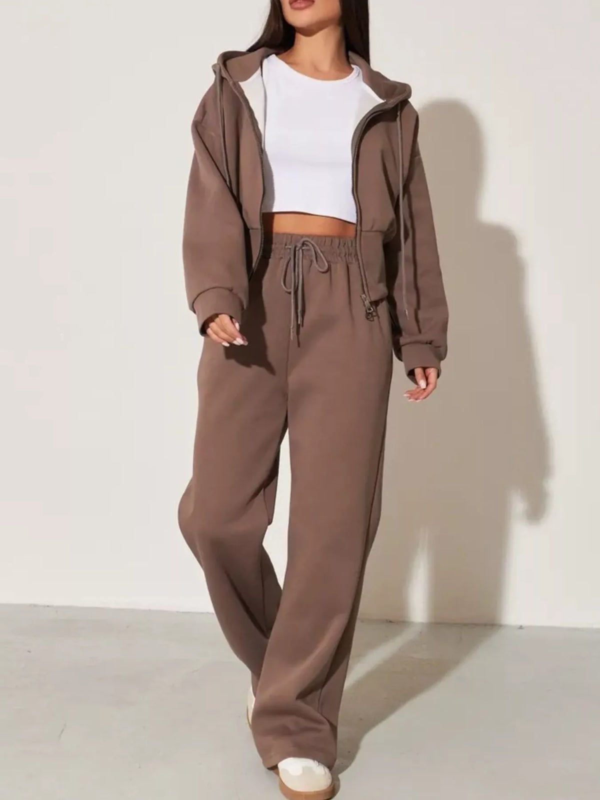 Plush Fashion Hub zip-up hoodie and wide-leg pants loungewear set, showing the comfortable fit and soft fabric in a relaxed style.
