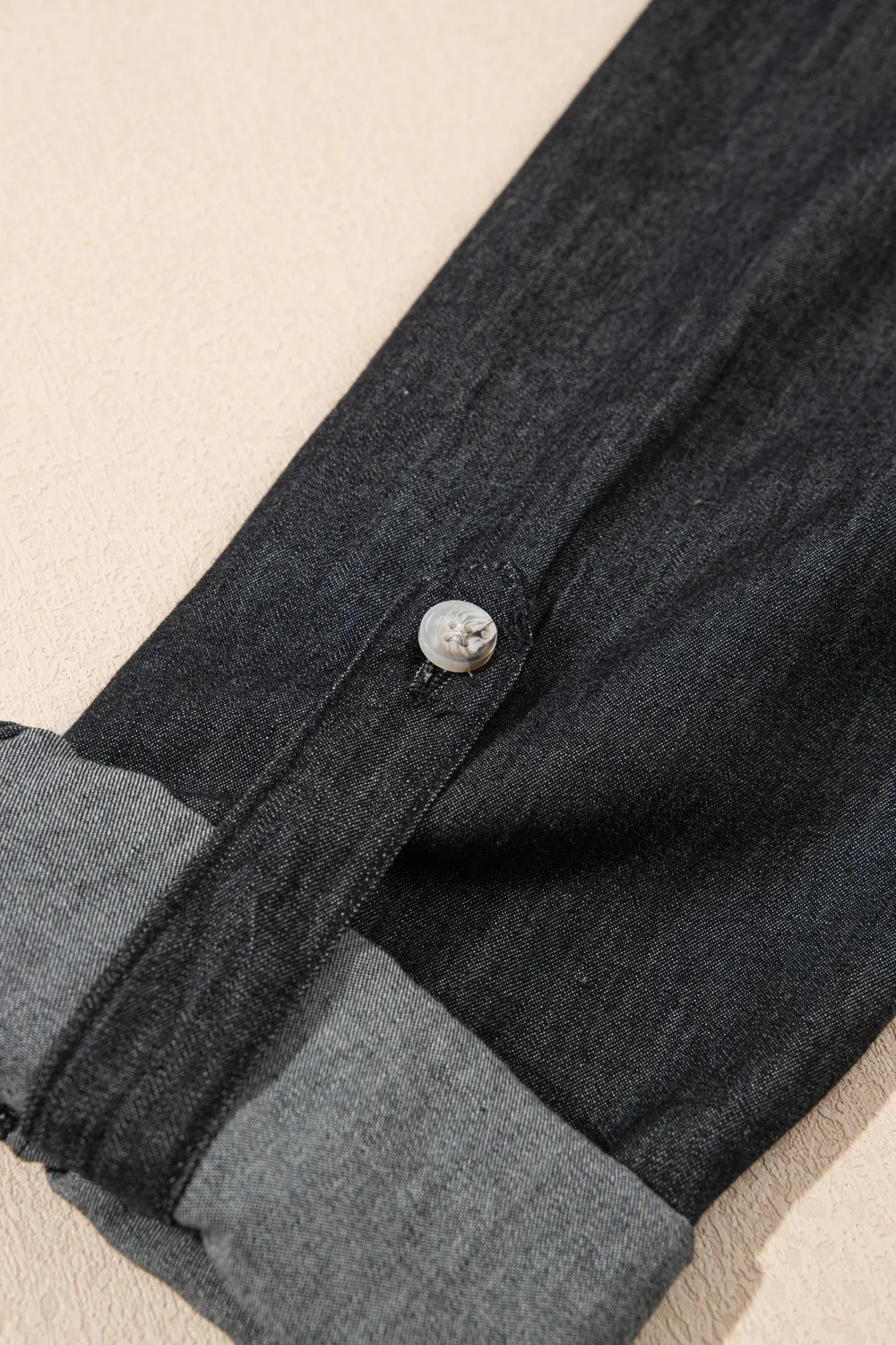 Trendsi denim top with long sleeves, collared neck, and chest pockets, showcasing casual style and classic denim fabric.