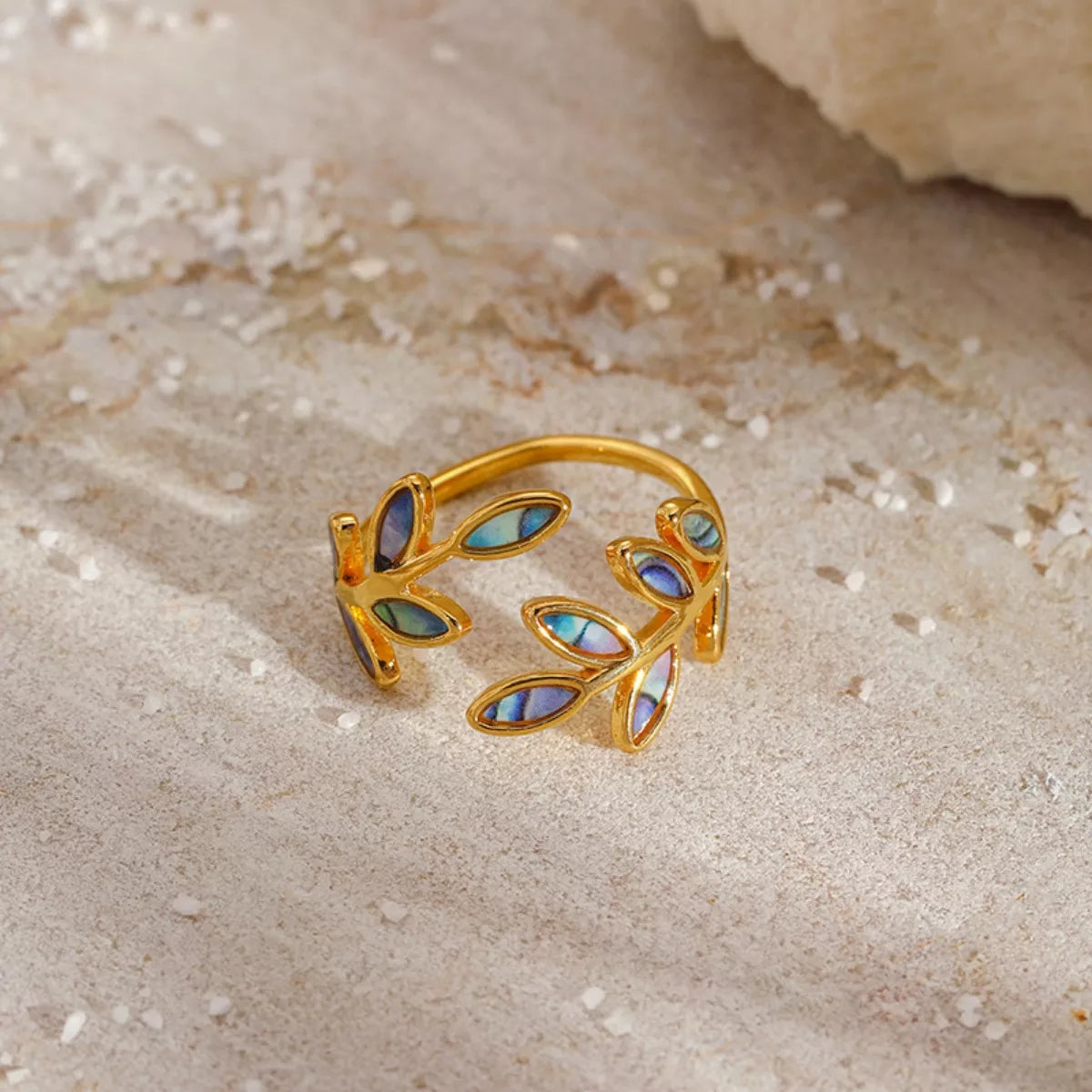 18K gold-plated resin leaf bypass ring featuring a nature-inspired design, stylish and elegant jewelry by Plush Fashion Hub
