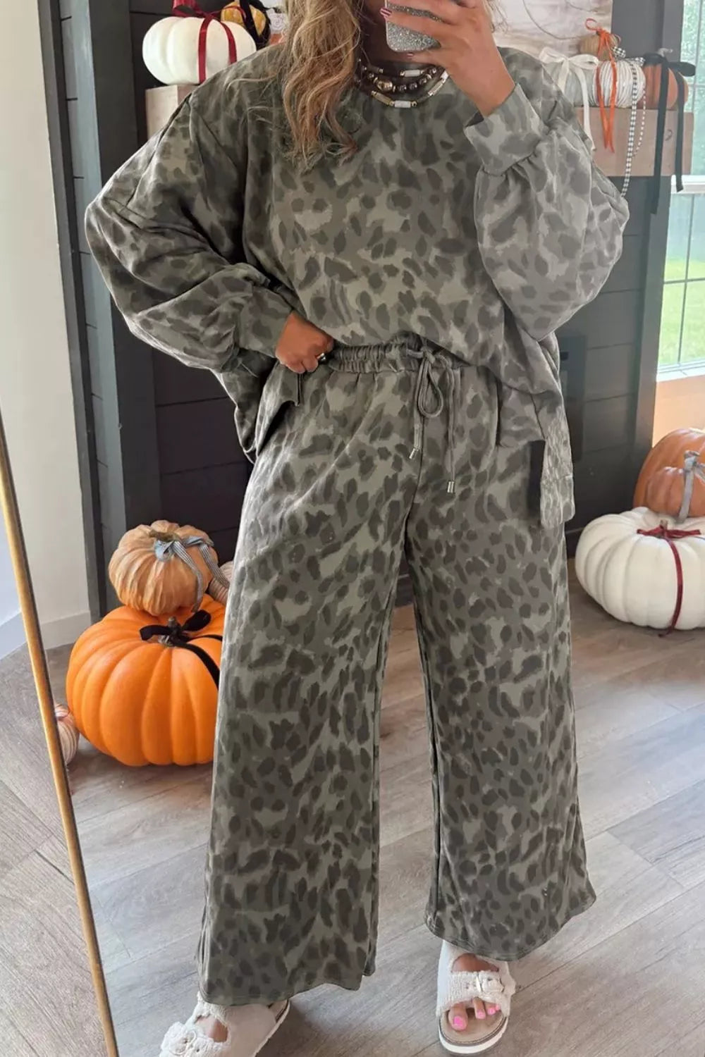 Leopard print long sleeve top and matching pants set by Trendsi, stylish animal print loungewear outfit.