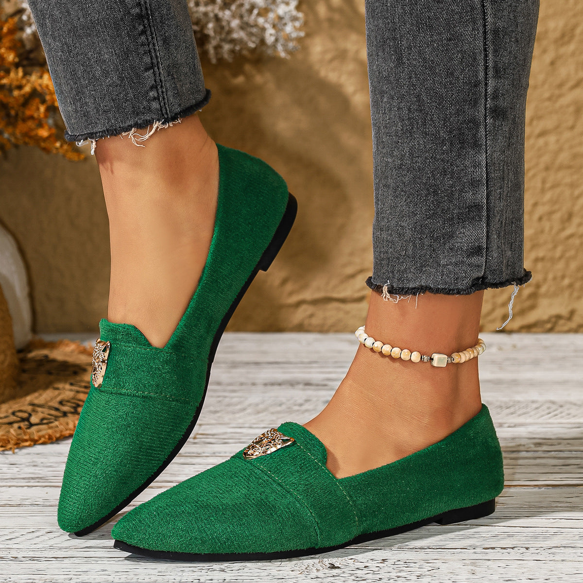 Point toe slip-on footwear by Trendsi featuring sleek design and comfortable fit, perfect for casual or dressy occasions.
