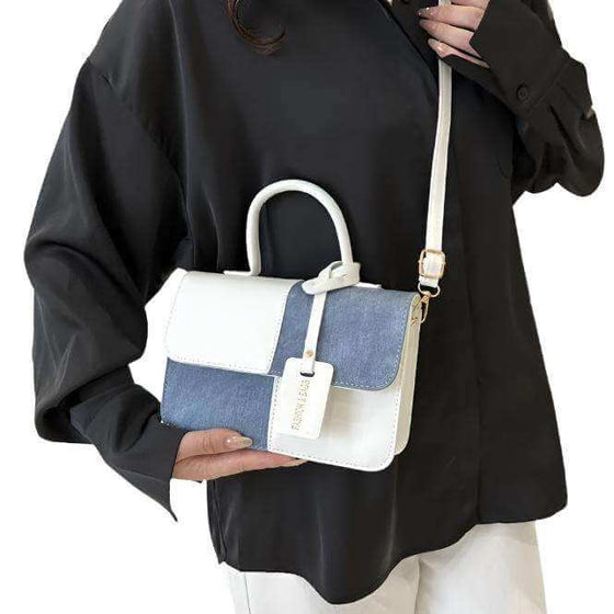 Ladies fashion stitch texture shoulder messenger bag with unique design and adjustable strap.