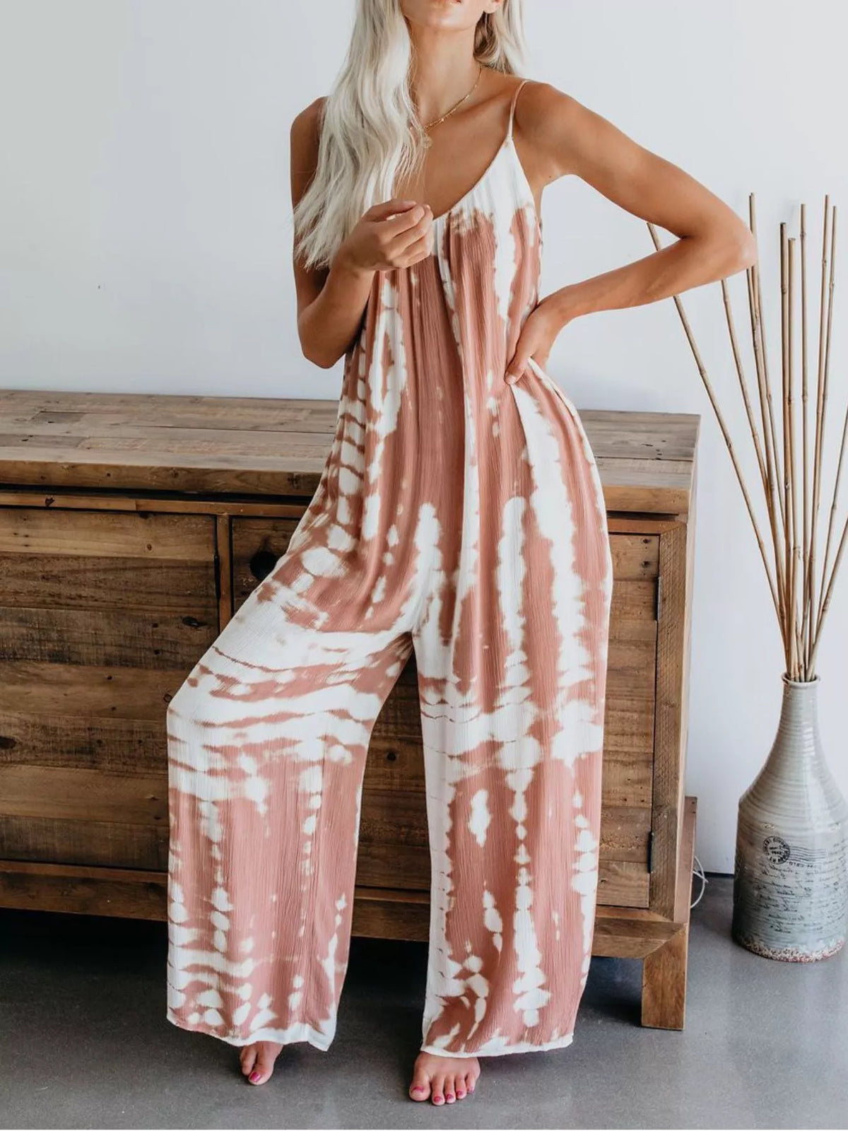 Plus size tie-dye wide-leg jumpsuit by Plush Fashion Hub featuring a full-length design and relaxed fit.