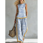 Printed retro sleeveless top and wide-leg pants two-piece set by FitiqueFit featuring vibrant 12 print designs, available in sizes S–5XL.