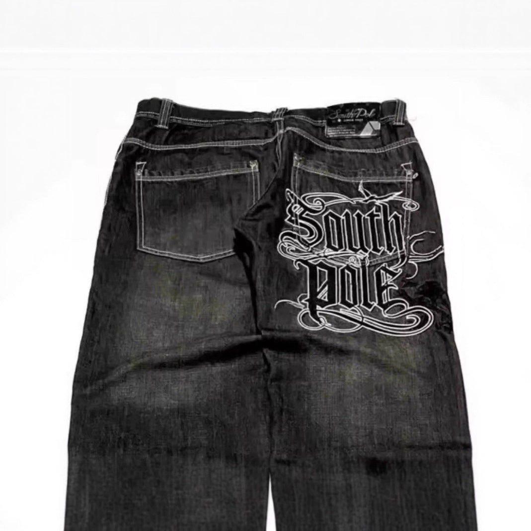 Eprolo retro washed wide-leg denim jeans with distressed details and high-waisted fit, styled on a model.