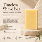 White Tea + Ginger shave bar soap by Timeless Organics Skin Care, shown in a close-up image with a clean, textured surface.