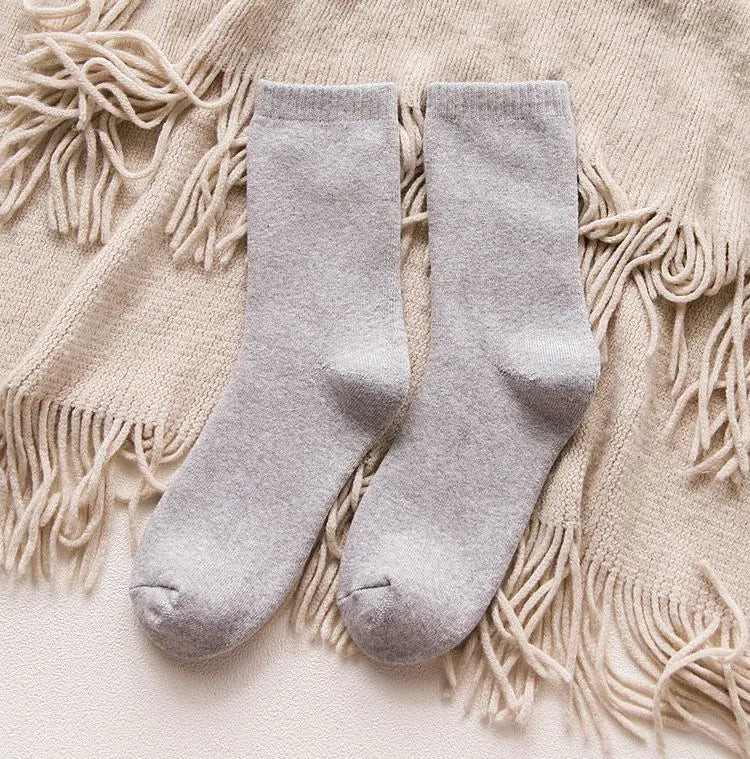 Thick cotton women's thermal socks for autumn and winter, cozy and warm, designed for cold weather comfort.