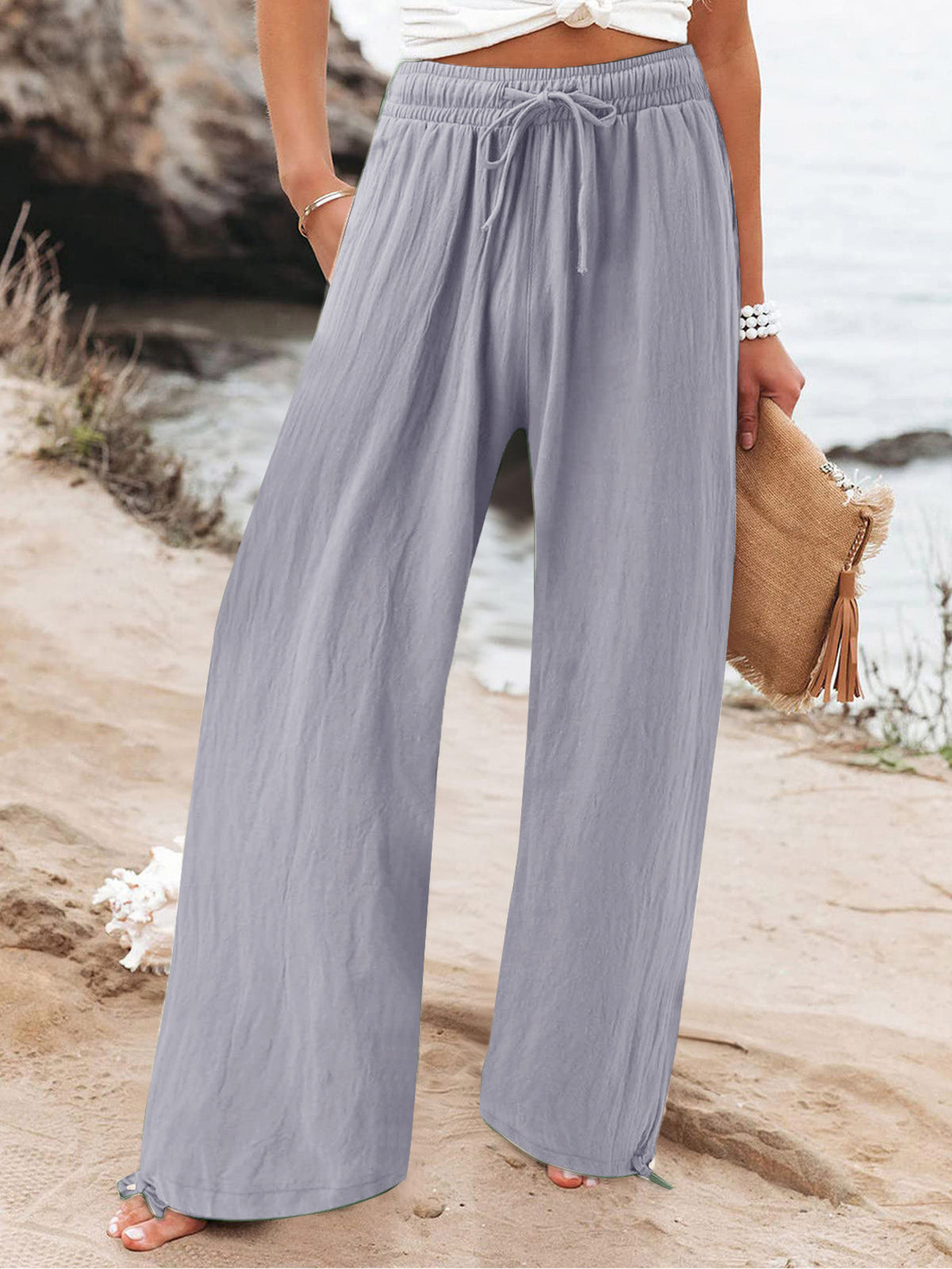 Plus size full length drawstring wide-leg pants from Trendsi, featuring a relaxed fit and comfortable waistband.