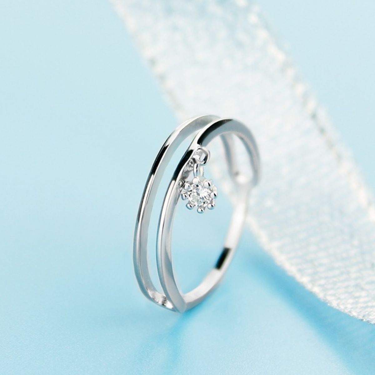 Double layered 925 sterling silver ring with intricate design, showcasing a stylish and elegant jewelry piece from Plush Fashion Hub.