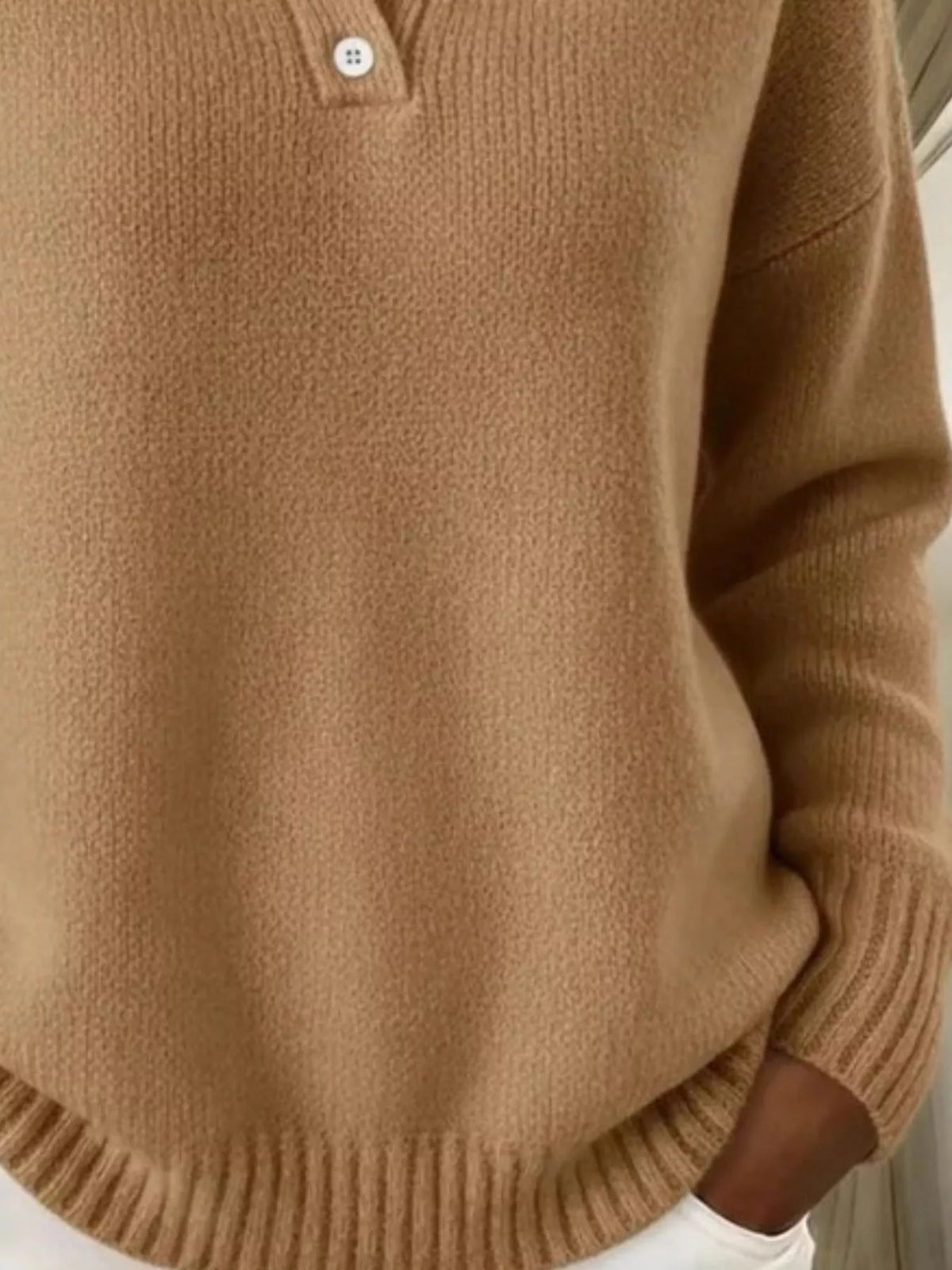 Plus size Trendsi sweater with button details and dropped shoulders, featuring a full-sized design and cozy knit fabric.