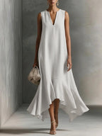 Women's deep V-neck sleeveless asymmetrical patchwork maxi dress by FitiqueFit, featuring a flowing design and unique hemline.