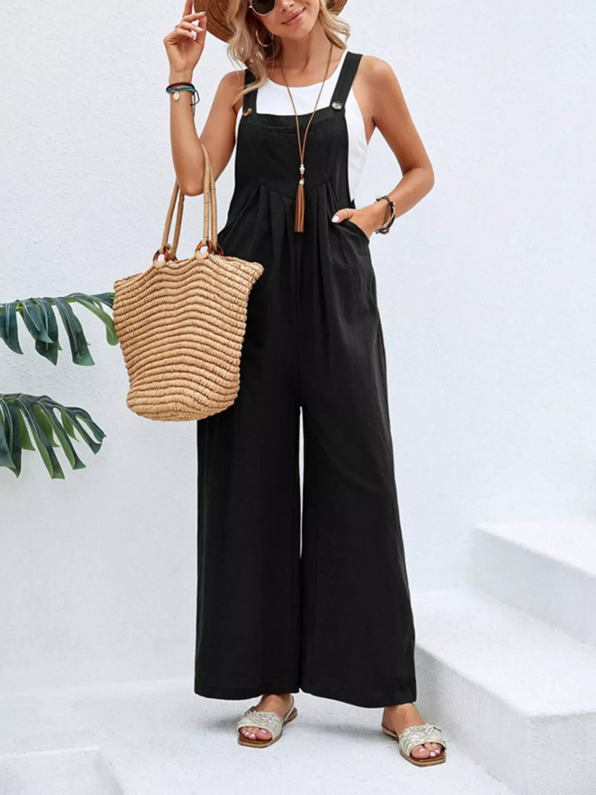 Plus size casual wide-leg jumpsuit with pockets by Plush Fashion Hub, full-length overalls in a relaxed fit with comfortable fabric.