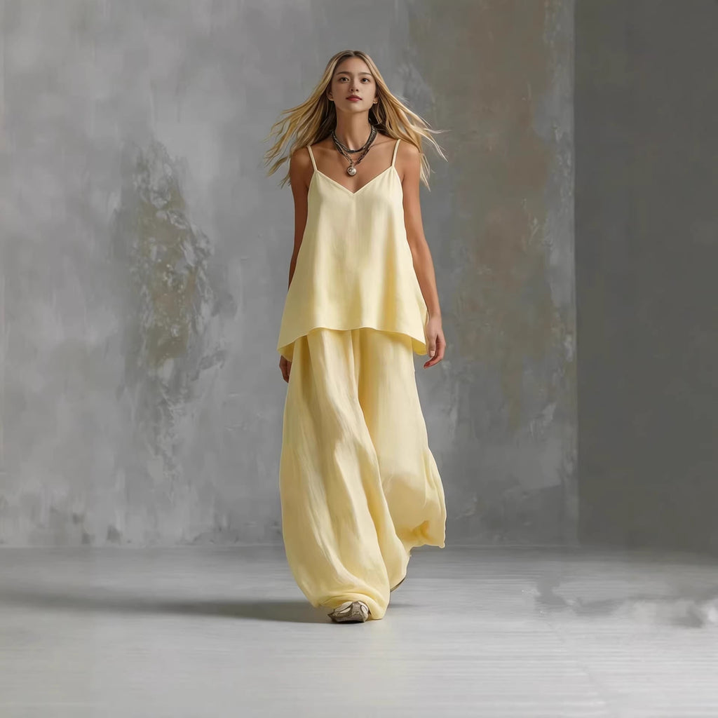 Women's sleeveless off-shoulder pantsuit from FitiqueFit, featuring a stylish 2-piece casualwear set with tailored pants and top.