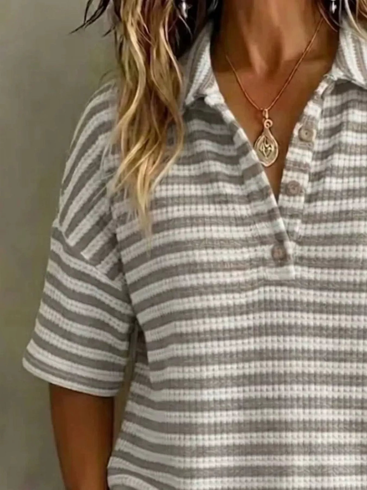 Plus size contrast striped knit polo shirt from Trendsi, featuring a full-size, comfortable tops design with bold stripe details.