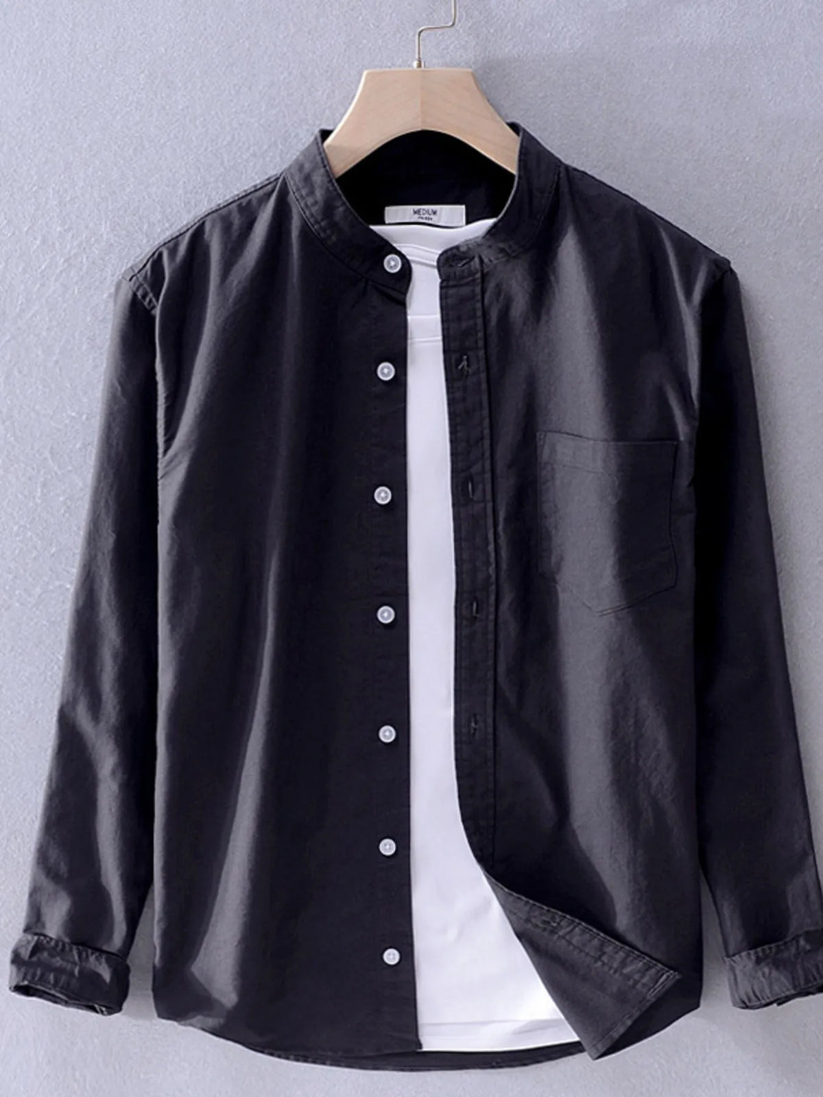 Men's plus size button-up long sleeve shirt by Trendsi, shown in navy blue with a classic collar and front buttons.
