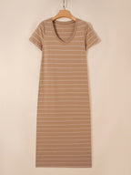 Women's striped short sleeve maxi T-shirt dress with side slit from Trendsi, showing a casual, comfortable fit with bold stripe pattern.