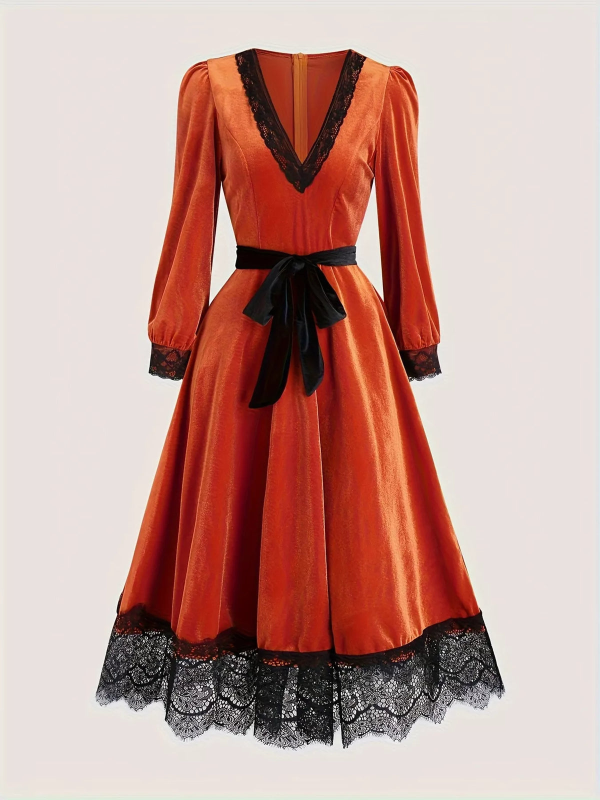 Velvet V-neck midi dress with lace trim and waist tie, featuring a stylish and elegant design by Trendsi.