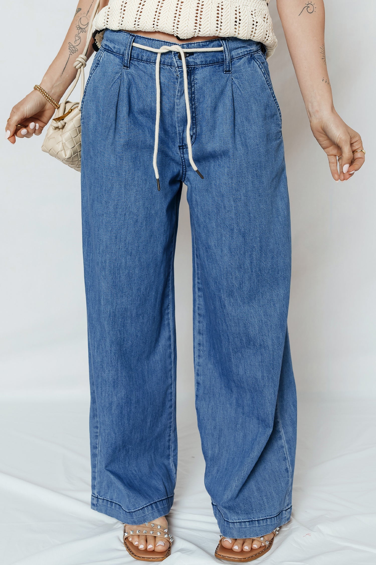 Oakleigh on wide leg jeans by Threaded Pear, featuring a high-waisted design and wide-leg fit in classic denim fabric.