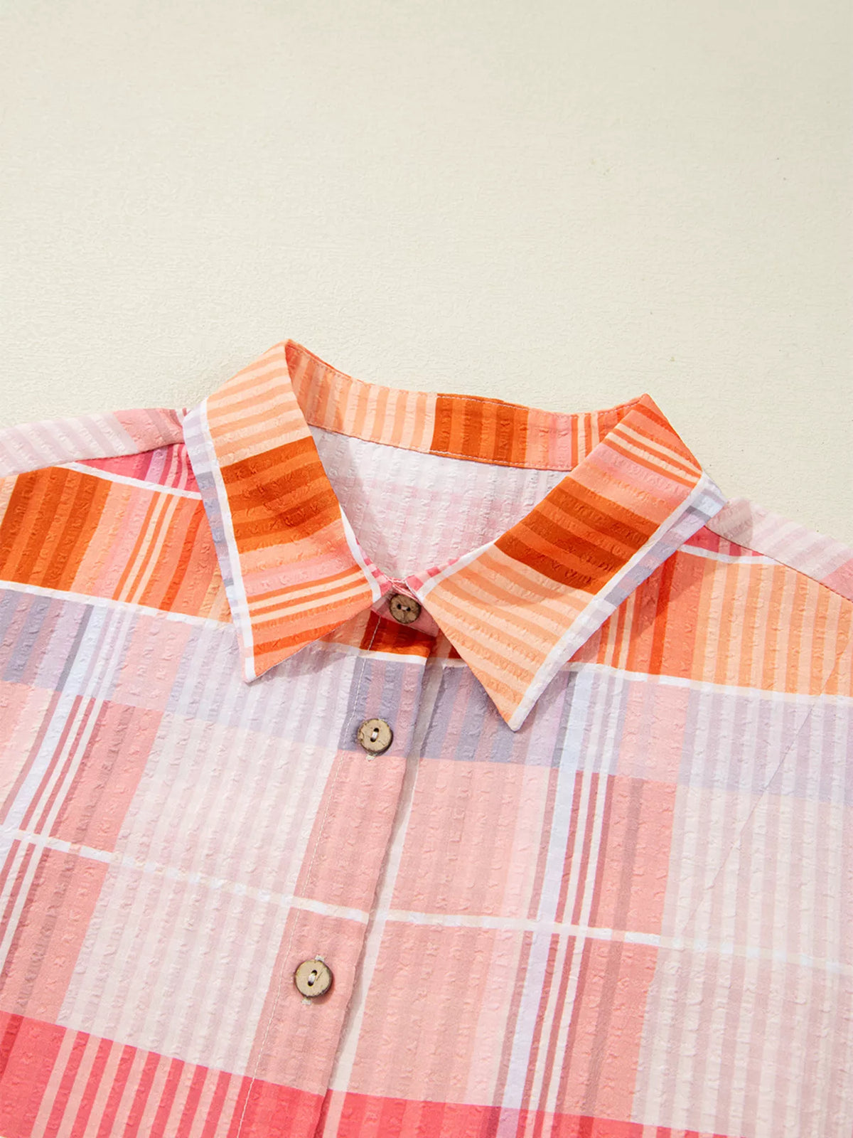 Oversized check tunic shirt for women featuring a relaxed fit, button-down front, and classic plaid pattern from Trendsi.