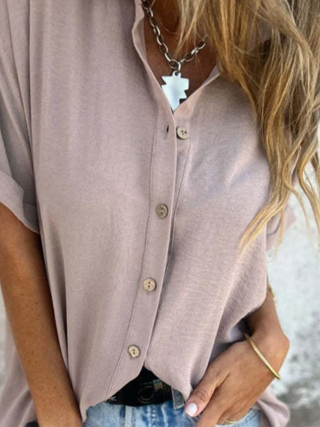 Women's collared button-down office blouse by Plush Fashion Hub, featuring half sleeves and a tailored fit in a professional top style.