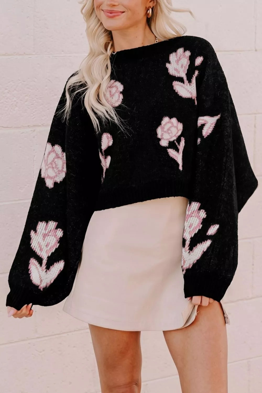 Floral pattern puff sleeve dropped shoulder pullover sweater by Trendsi, featuring a cozy knit design and feminine floral details.