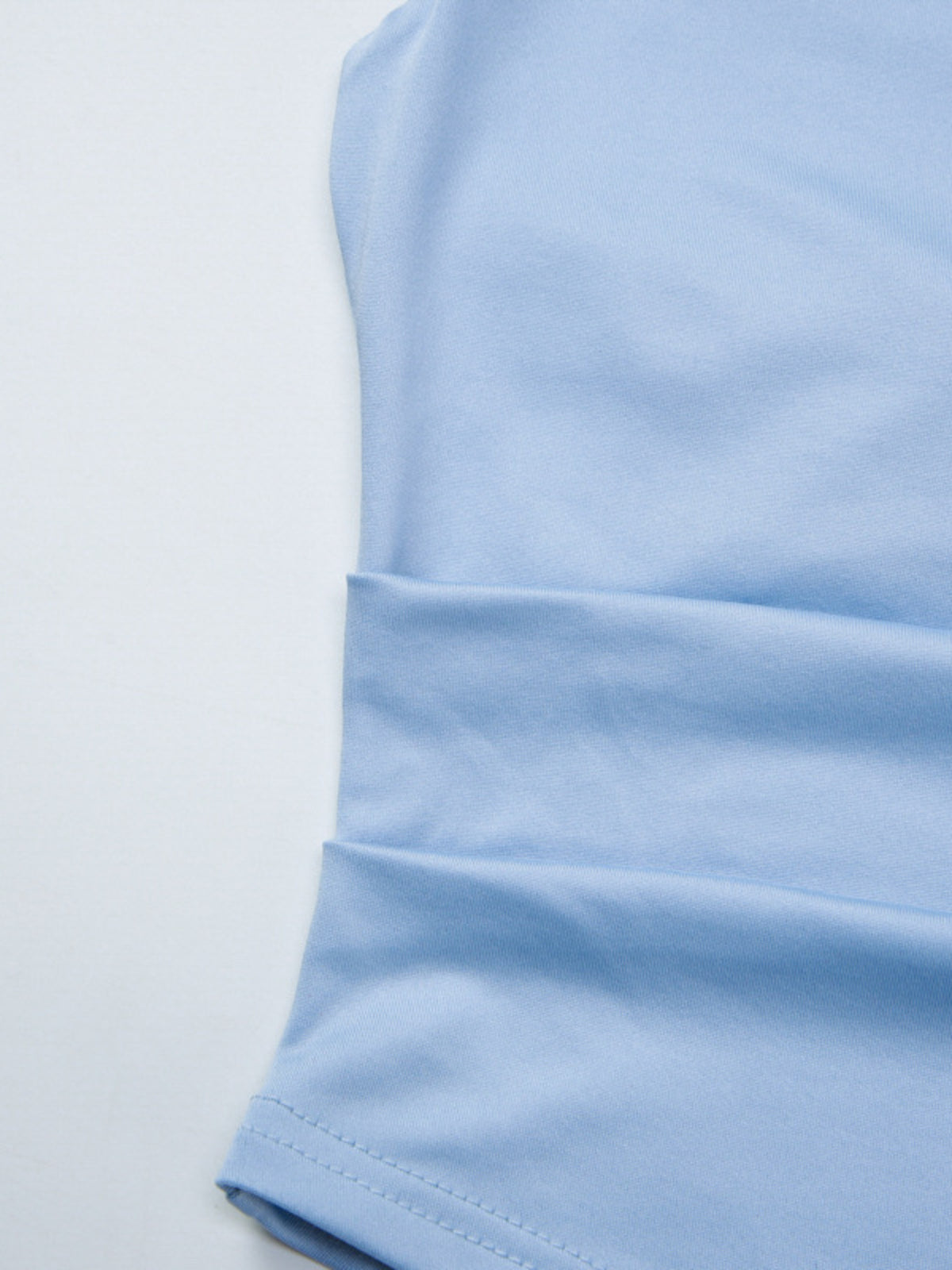 Women’s asymmetrical ruched cami top with tie detail from Plush Fashion Hub, featuring a stylish, fitted design and sleeveless cut.