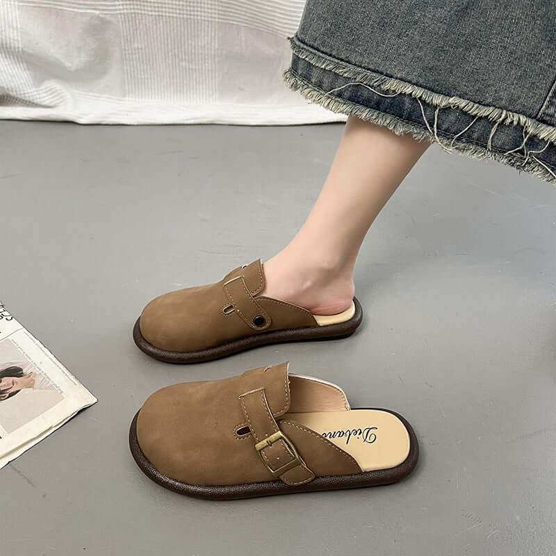 Women's suede round toe slip-ons for everyday wear.