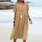 Women's casual cotton linen short-sleeve midi dress by Plush Fashion Hub, displayed on a hanger with a relaxed fit and neutral color.