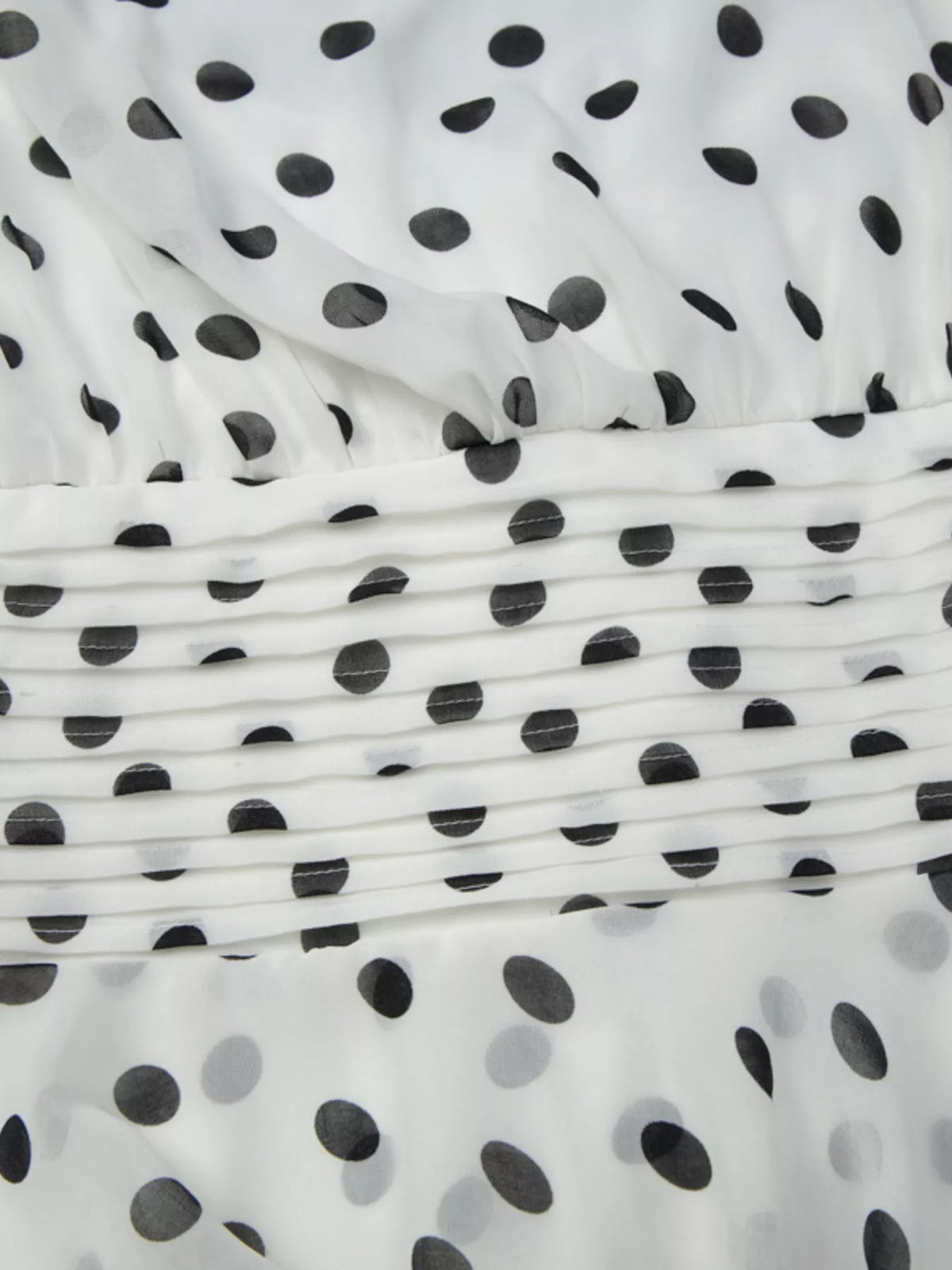 Polka dot halter neck ruffle dress from Plush Fashion Hub featuring a stylish design and feminine ruffle details.
