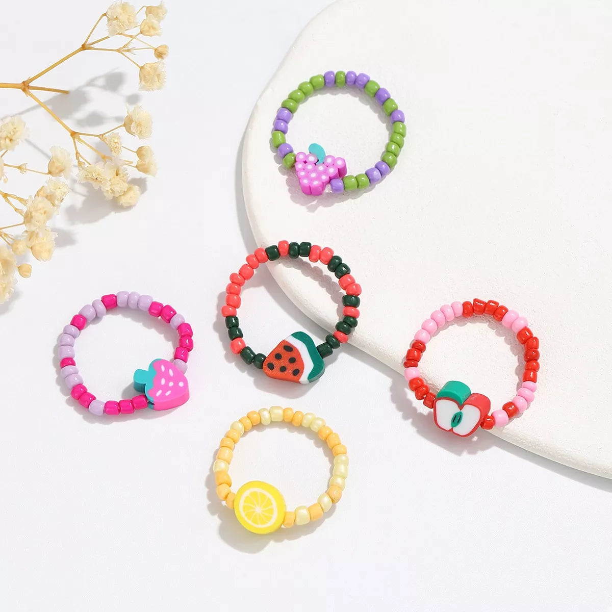Colorful fruit beaded ring from Plush Fashion Hub featuring vibrant fruit charms and intricate beaded design.