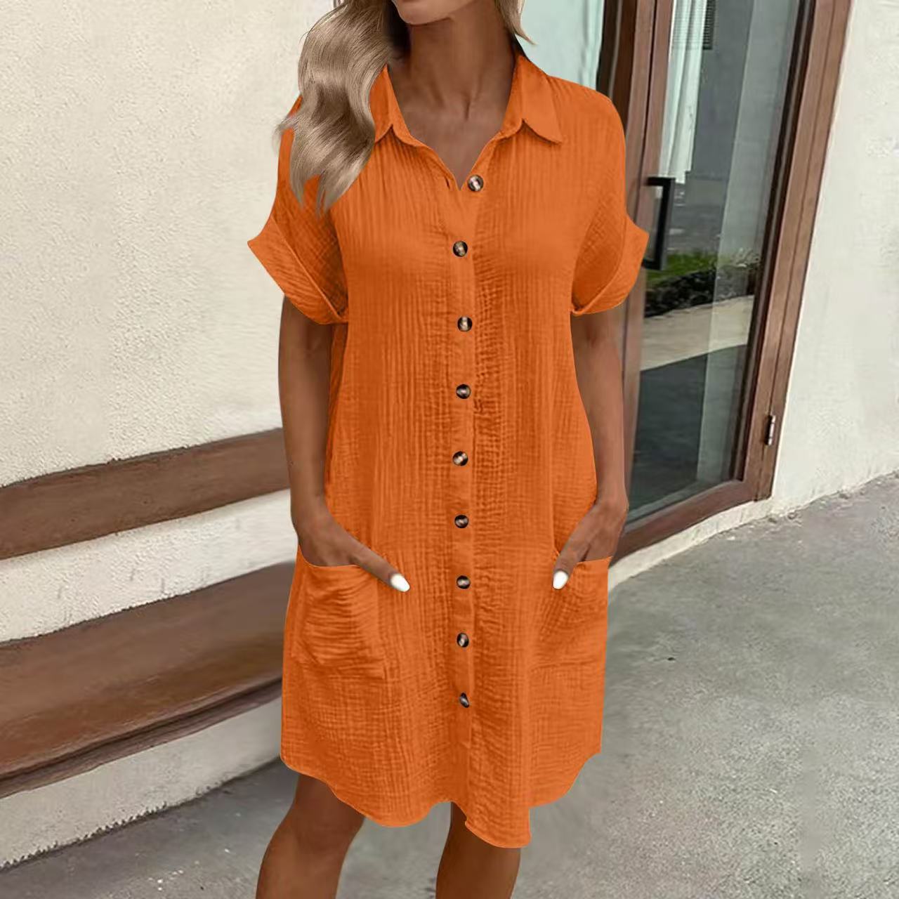 Women's casual loose short-sleeve midi shirt dress with button-down front, by FitiqueFit, shown on a model.