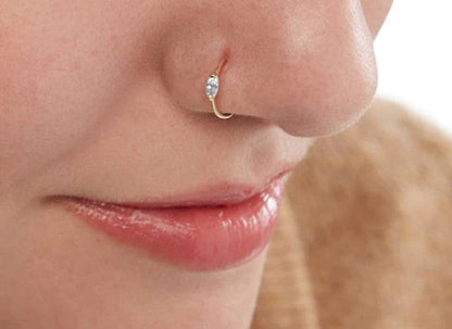 Sterling Silver Diamond Body Piercing Jewelry Nose RingEnhance your style and make a statement with our Sterling Silver Diamond Body Piercing Jewelry Nose Ring! Made with eco-friendly electroplating, this geometric shapeNose RingPlush Fashions ShopPlush Fashion Shop