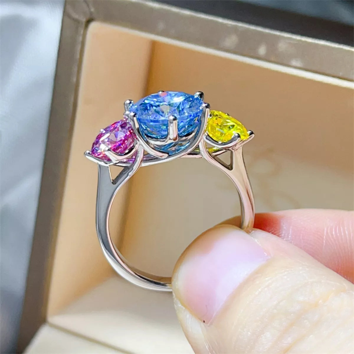 Sterling silver ring with a 5-carat moissanite gemstone, showcasing a sparkling, elegant design.