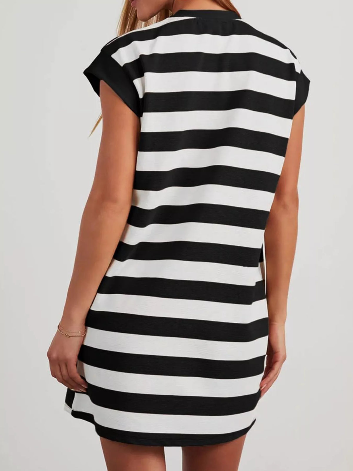 Plus size casual striped short sleeve mini dress by Plush Fashion Hub, featuring a comfortable fit and stylish design.