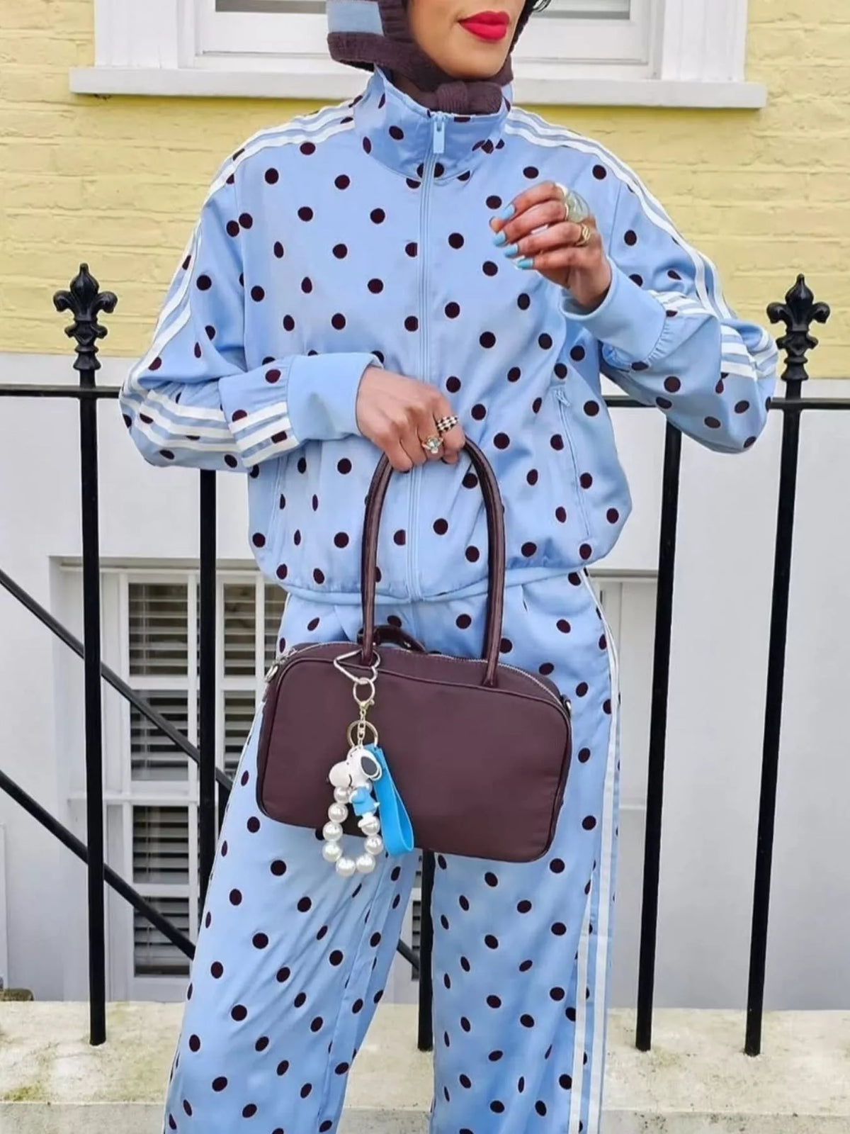 Polka dot zip-up outerwear and pants set by Plush Fashion Hub, featuring a stylish matching polka dot design.