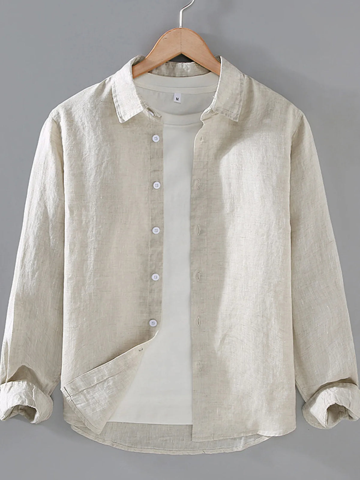 Men's plus size long sleeve button-up shirt by Plush Fashion Hub, featuring a classic collar and chest pocket, in a comfortable fit.