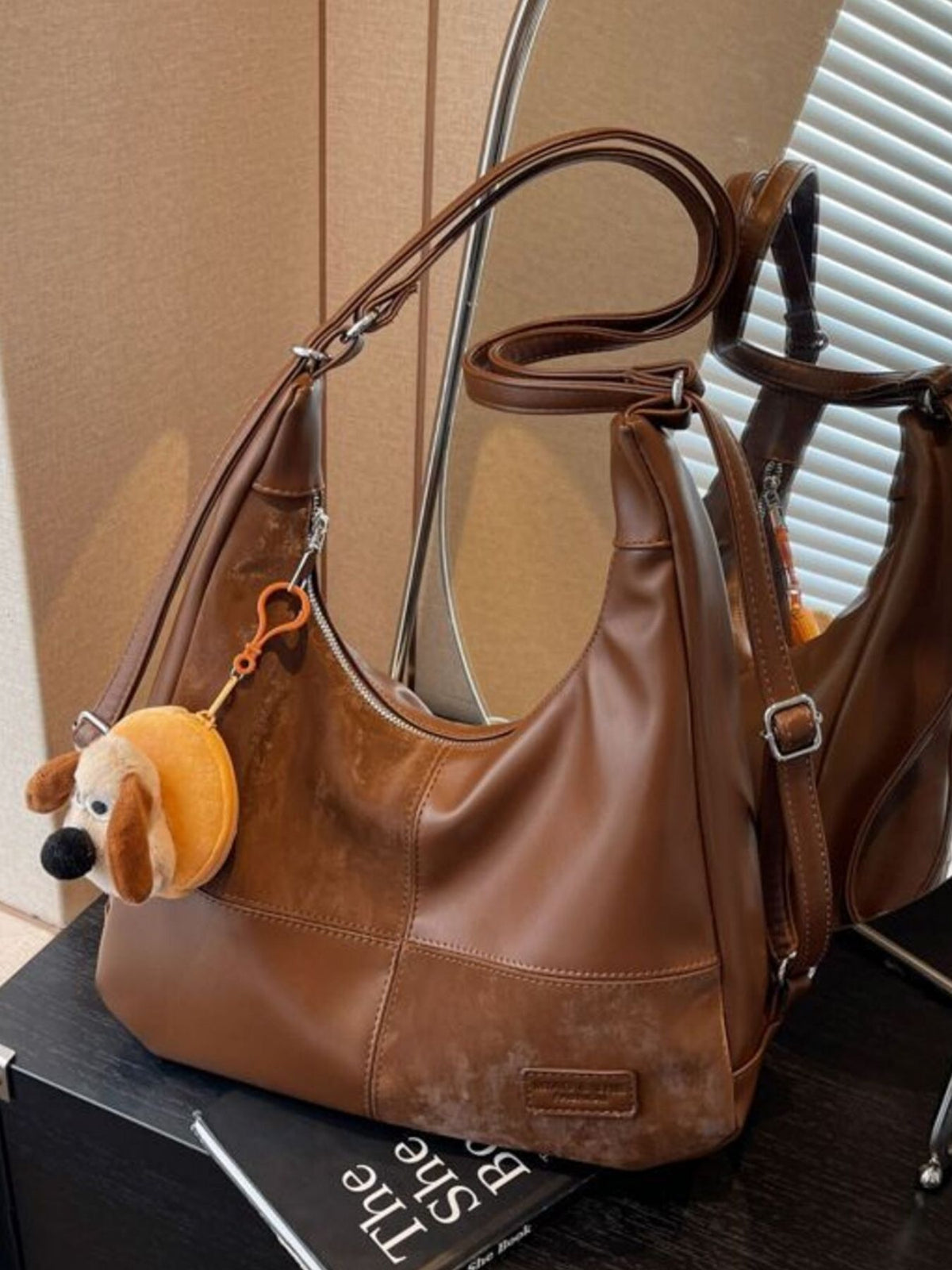 Vintage-inspired plush fashion hub PU leather slouchy hobo shoulder bag with a relaxed, slouchy design and top handle in soft leather.