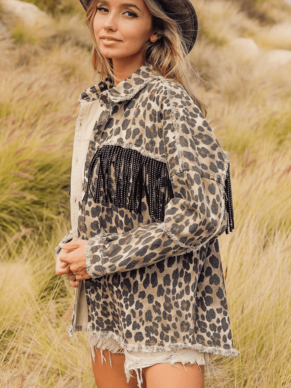 Leopard fringe detail collar denim jacket from Plush Fashion Hub, showcasing stylish design and collar with fringe accents.