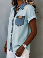 Denim trim short sleeve shirt from Trendsi, casual tops with button front and relaxed fit, displayed on a hanger.