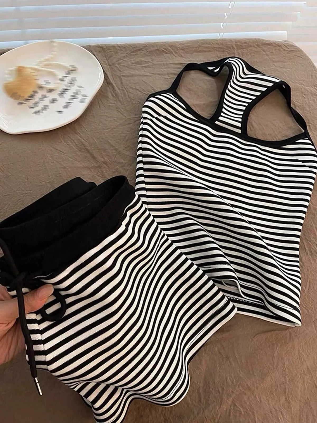 Striped tank top and shorts set by Plush Fashion Hub, featuring a casual summer look with comfortable shorts and a sleeveless top.