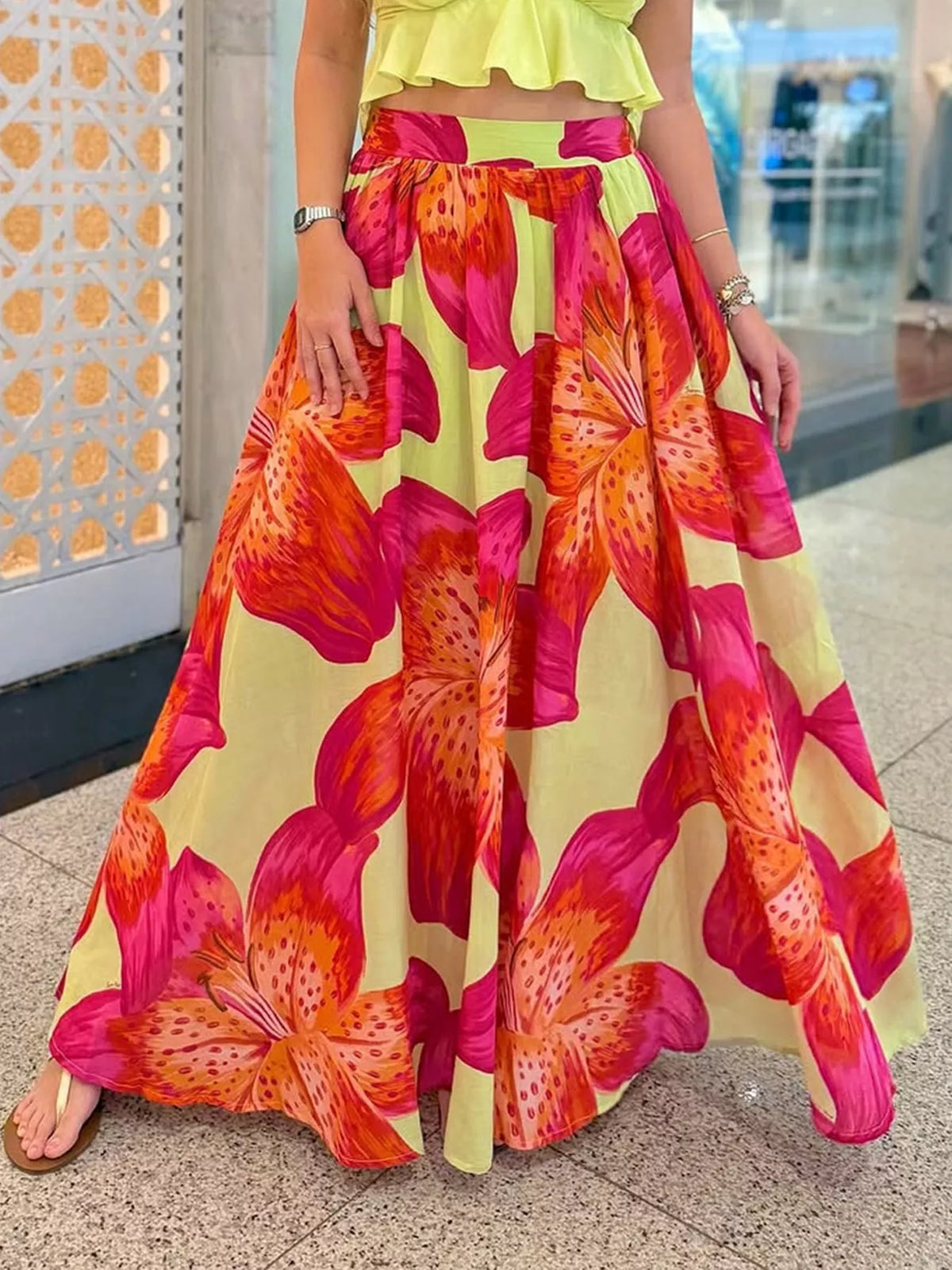 Women's lightweight boho floral print flowy maxi skirt with pockets, by Plush Fashion Hub, shown in a relaxed, flowing style.