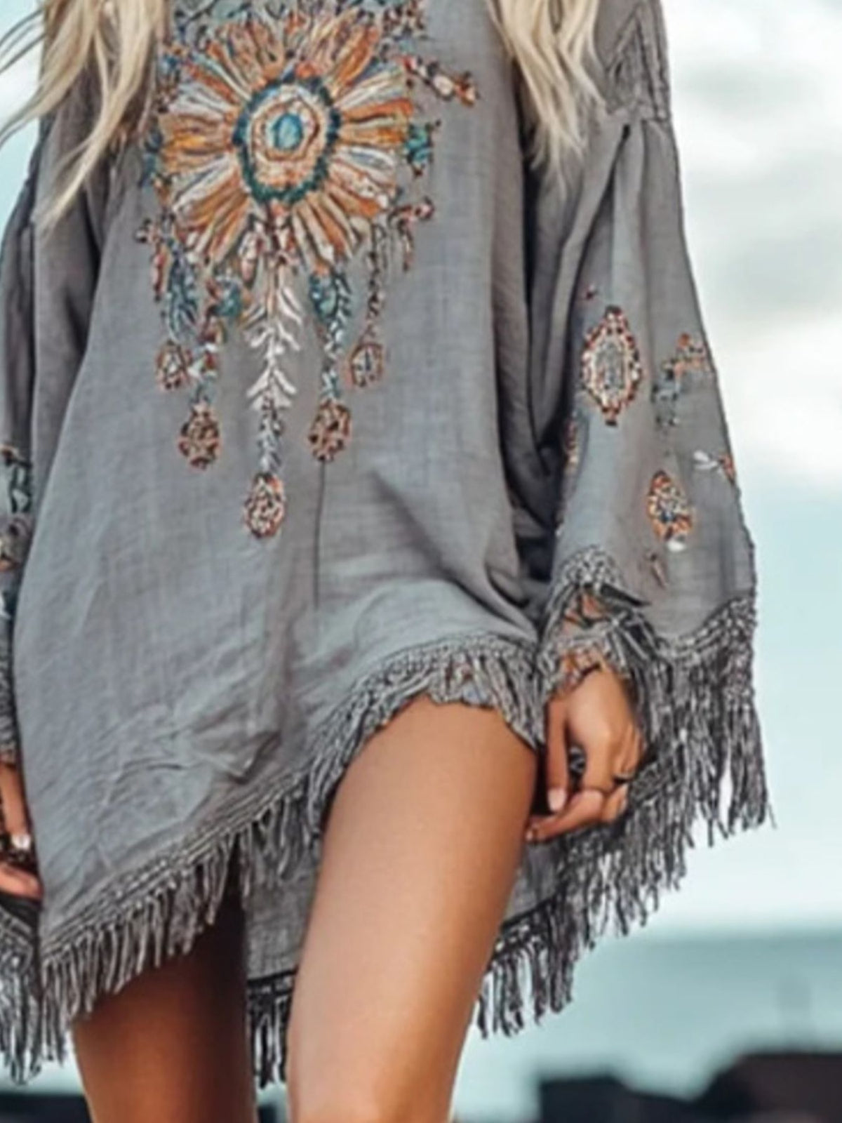 Plush Fashion Hub chic fringe hem long sleeve mini dress, elegant cocktail party wear with stylish design and flattering fit.