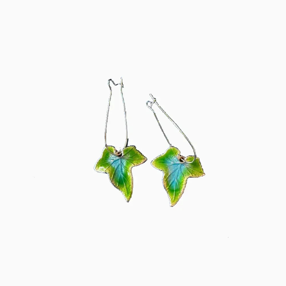 Plush Fashion Hub alloy leaf drop earrings featuring intricate leaf-shaped design and dangling style on a white background.