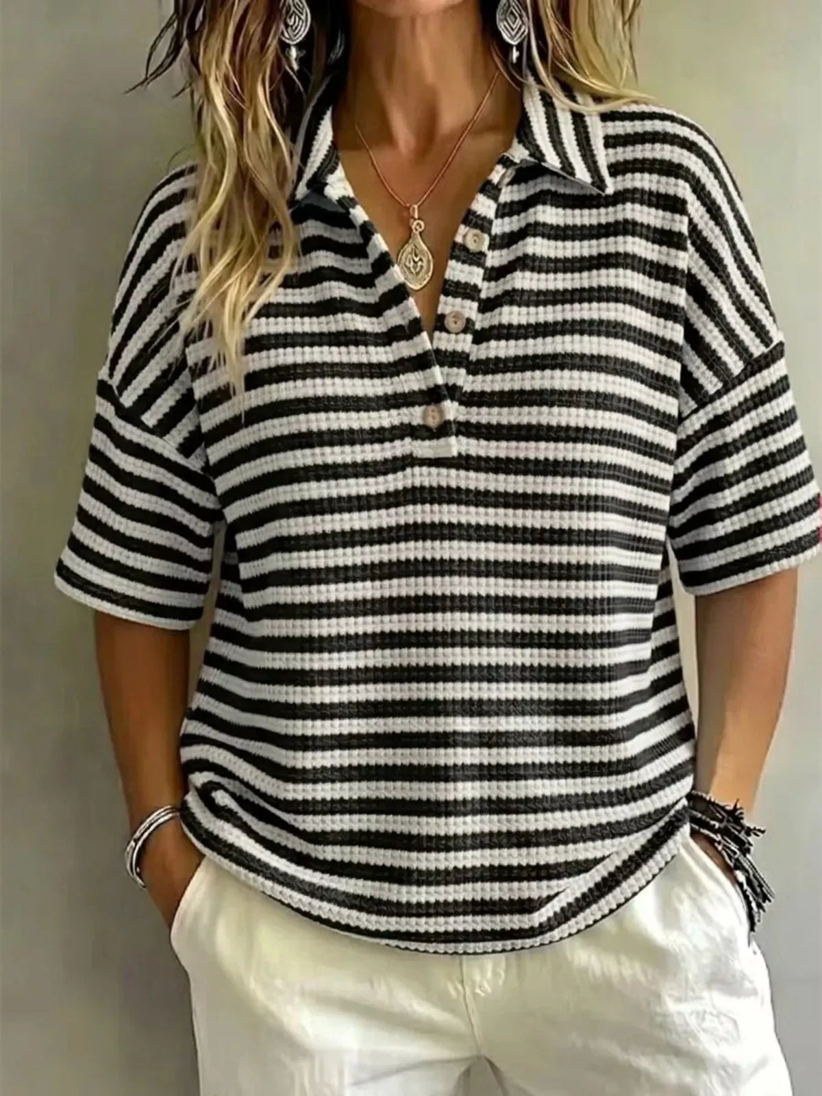 Plus size contrast striped knit polo shirt from Trendsi, featuring a full-size fit and classic polo collar, shown on a model.